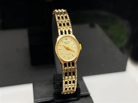 pre owned ladies gold watches